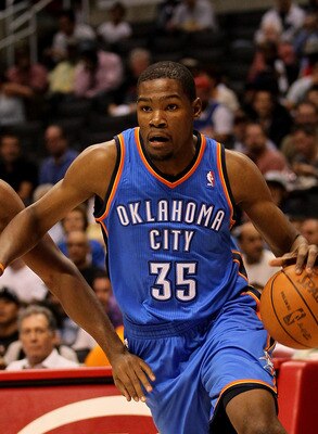 LOS ANGELES - NOVEMBER 3:  Kevin Durant #32 of the Oklahoma City Thunder drives past Ryan Gomes #15 of the Los Angeles Clippers at Staples Center on November 3, 2010 in Los Angeles, California.  NOTE TO USER: User expressly acknowledges and agrees that, b