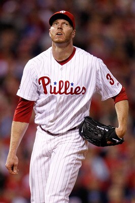 PHILADELPHIA - OCTOBER 16:  Roy Halladay #34 of the Philadelphia Phillies looks up after throwing a pitch in the first inning against the San Francisco Giants in Game One of the NLCS during the 2010 MLB Playoffs at Citizens Bank Park on October 16, 2010 i