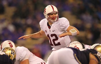 SEATTLE - OCTOBER 30:  Quarterback Andrew Luck #12 of the Stanford Cardinal calls a play at the line of scrimmage during the game against the Washington Huskies on October 30, 2010 at Husky Stadium in Seattle, Washington. Stanford won 41-0. (Photo by Otto