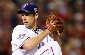 ARLINGTON, TX - NOVEMBER 01:  Starting pitcher Cliff Lee #33 of the Texas Rangers pitches against the San Francisco Giants in Game Five of the 2010 MLB World Series at Rangers Ballpark in Arlington on November 1, 2010 in Arlington, Texas. The Giants won 3
