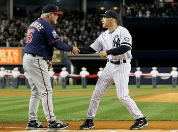 NEW YORK - OCTOBER 09:  Manager Joe Girardi #28 (R) of the New York Yankees greets manager Ron Gardenhire #35 of the Minnesota Twins prior to Game Three of the ALDS part of the 2010 MLB Playoffs at Yankee Stadium on October 9, 2010 in the Bronx borough of