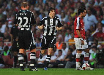 Barton back after prison spell