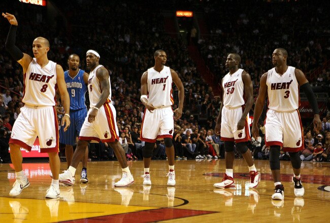 MIAMI - OCTOBER 29:  Starting five guard Carlos Arroyo #8, Forward LeBron James #6, Forard Chris Bosh #1, Center Joel Anthony #55 and Dwyane Wade #3 of the Miami Heat take on the Orlando Magic at American Airlines Arena on October 29, 2010 in Miami, Flori