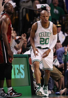 BOSTON - APRIL 20:  Ray Allen #20 of the Boston Celtics celebrates his three point shot as Dwyane Wade #3 of the Miami Heat looks on during Game Two of the Eastern Conference Quarterfinals of the 2010 NBA playoffs at the TD Garden on April 20, 2010 in Bos