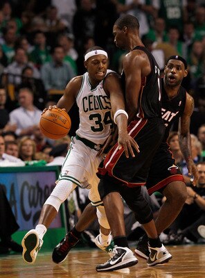 BOSTON, MA - OCTOBER 26:  Paul Pierce #34 of the Boston Celtics drives around Chris Bosh #1 and LeBron James #6 of the Miami Heat during a game against the Miami Heat at the TD Banknorth Garden on October 26, 2010 in Boston, Massachusetts. NOTE TO USER: U