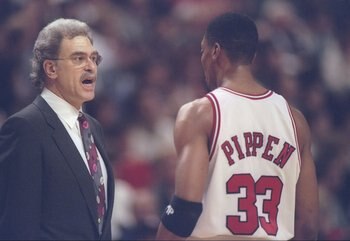 7 Mar 1997: Coach Phil Jackson and forward Scottie Pippen of the Chicago Bulls have a discussion during a game against Indiana Pacers tries to steal the pass at the United Center in Chicago, Illinois. The Bulls won the game 104 - 96.