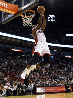 MIAMI - NOVEMBER 06:  Forward LeBron James #6 of the Miami Heat dunks against the New Jersey Nets  at American Airlines Arena on November 6, 2010 in Miami, Florida. NOTE TO USER: User expressly acknowledges and agrees that, by downloading and or using thi