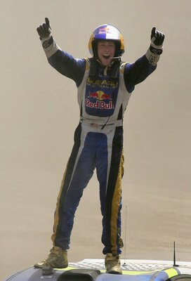 CARSON, CA - AUGUST 03:  Gold medal winner Travis Pastrana celebrates after winning the Rally Car race during the summer X Games 14 at Home Depot Center on August 3, 2008 in Carson, California.  (Photo by Christian Petersen/Getty Images)