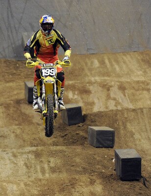 LOS ANGELES, CA - AUGUST 01:  Travis Pastrana competes to a gold medal in the Moto X Speed & Style Final during X Games 16 at Staples Center on August 1, 2010 in Los Angeles, California.  (Photo by Harry How/Getty Images)
