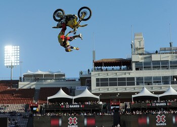 LOS ANGELES, CA - JULY 29:  Travis Pastrana competes in the Moto X Freestyle Final during X Games 16 at the LA Coliseum on July 29, 2010 in Los Angeles, California. Pastrana would win the gold medal.  (Photo by Harry How/Getty Images)