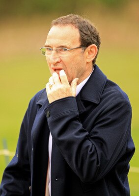 VIRGINIA WATER, ENGLAND - MAY 20:  Aston Villa Manager Martin O'Neill walks down the 5th hole during the first round of the BMW PGA Championship on the West Course at Wentworth on May 20, 2010 in Virginia Water, England.  (Photo by Warren Little/Getty Ima