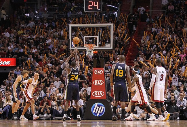 MIAMI - NOVEMBER 09:  Paul Millsap #24 of the Utah Jazz shoots a foul shot during a game against the Miami Heat at American Airlines Arena on November 9, 2010 in Miami, Florida. NOTE TO USER: User expressly acknowledges and agrees that, by downloading and