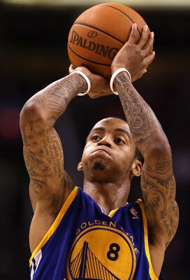 PHOENIX - OCTOBER 19:  Monta Ellis #8 of the Golden State Warriors shoots a free throw shot against the Phoenix Suns during the preseason NBA game at US Airways Center on October 19, 2010 in Phoenix, Arizona. NOTE TO USER: User expressly acknowledges and