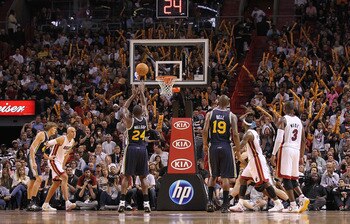 MIAMI - NOVEMBER 09:  Paul Millsap #24 of the Utah Jazz shoots a foul shot during a game against the Miami Heat at American Airlines Arena on November 9, 2010 in Miami, Florida. NOTE TO USER: User expressly acknowledges and agrees that, by downloading and