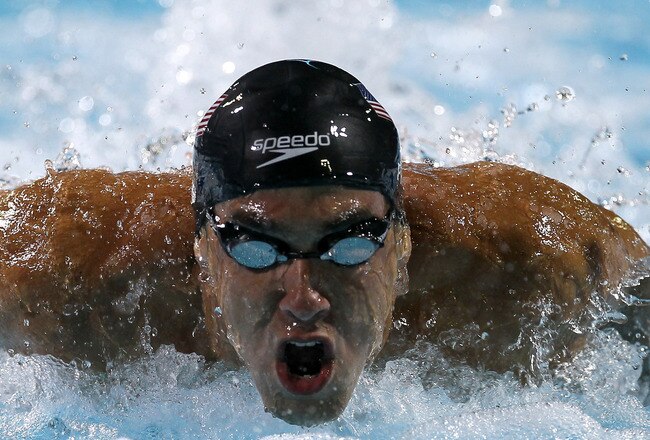 IRVINE, CA - AUGUST 21:  Michael Phelps swims the butterfly leg of the 4X100m medley relay during the Mutual of Omaha Pan Pacific Championships at the William Woollett Jr. Aquatic Center on August 21, 2010 in Irvine, California.  (Photo by Stephen Dunn/Ge