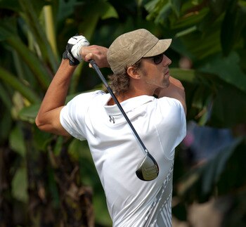 HAIKOU, CHINA - OCTOBER 31:  Michael Phelps of USA plays a shot during day five of the Mission Hills Start Trophy tournament at Mission Hills Resort on October 31, 2010 in Haikou, China. The Mission Hills Star Trophy is Asia's leading leisure liflestyle e
