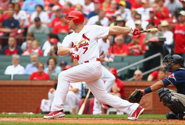 ST. LOUIS - SEPTEMBER 19: Matt Holliday #7 of the St. Louis Cardinals hits an RBI single against the San Diego Padres at Busch Stadium on September 19, 2010 in St. Louis, Missouri.  The Cardinals beat the Padres 4-1.  (Photo by Dilip Vishwanat/Getty Image