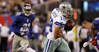 EAST RUTHERFORD, NJ - NOVEMBER 14: Miles Austin #19 of the Dallas Cowboys runs a reception against the New York Giants on November 14, 2010 at the New Meadowlands Stadium in East Rutherford, New Jersey.  (Photo by Jim McIsaac/Getty Images)