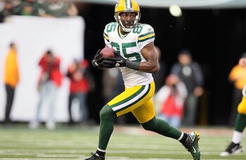 EAST RUTHERFORD, NJ - OCTOBER 31:  Greg Jennings #85 of the Green Bay Packers runs the ball against the New York Jets on October 31, 2010 at the New Meadowlands Stadium in East Rutherford, New Jersey.  (Photo by Jim McIsaac/Getty Images)