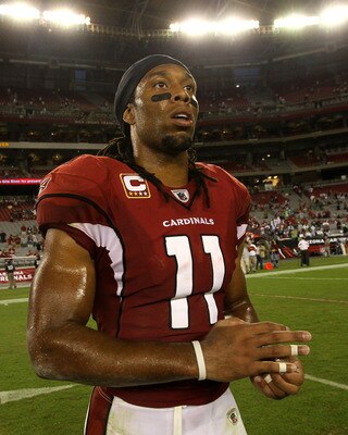 GLENDALE, AZ - NOVEMBER 14:  Wide receiver Larry Fitzgerald #11 of the Arizona Cardinals walks off the field after the game with the Seattle Seahawks at University of Phoenix Stadium on November 14, 2010 in Glendale, Arizona. Seattle won 36-18.  (Photo by