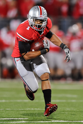 COLUMBUS, OH - NOVEMBER 13:  Dan Herron #1 of the Ohio State Buckeyes runs with the ball against the Penn State Nittany Lions at Ohio Stadium on November 13, 2010 in Columbus, Ohio.  (Photo by Jamie Sabau/Getty Images)