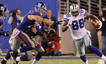 EAST RUTHERFORD, NJ - NOVEMBER 14:  Dez Bryant #88 of the Dallas Cowboys runs a kick off past Dave Tollefson #71, and Duke Calhoun #84 of the New York Giants on November 14, 2010 at the New Meadowlands Stadium in East Rutherford, New Jersey.  (Photo by Ji