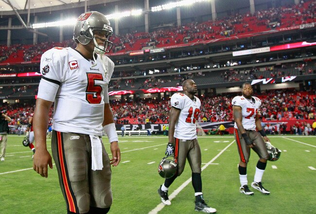 ATLANTA - NOVEMBER 07:  Quarterback Josh Freeman #5 of the Tampa Bay Buccaneers walks off the field after their 27-21 loss to the Atlanta Falcons at Georgia Dome on November 7, 2010 in Atlanta, Georgia.  (Photo by Kevin C. Cox/Getty Images)