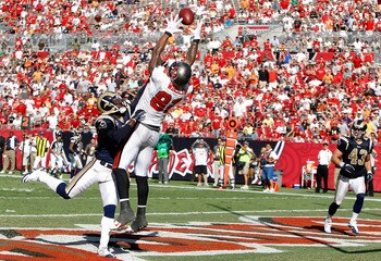 TAMPA, FL - OCTOBER 24:  Tightend Kellen Winslow #82 of the Tampa Bay Buccaneers cannot bring in this pass as safety Oshiomogho Atogwe #21 of the St. Louis Rams breaks it up during the game at Raymond James Stadium on October 24, 2010 in Tampa, Florida.