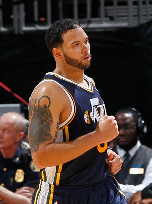 ATLANTA - NOVEMBER 12:  Deron Williams #8 of the Utah Jazz reacts after their 90-86 win over the Atlanta Hawks at Philips Arena on November 12, 2010 in Atlanta, Georgia.  NOTE TO USER: User expressly acknowledges and agrees that, by downloading and/or usi