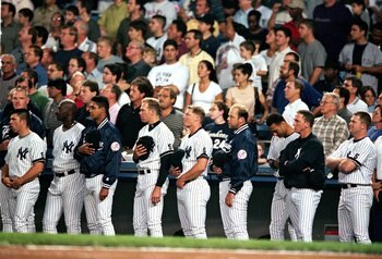 10 Sep 1999:  The New York Yankees take a moment of silence for the passing of Jim 'Catfish' Hunter before the game against the Boston Red Sox at Yankee Stadium in Bronx, New York. The Red Sox defeated the Yankees 4-1. Mandatory Credit: Ezra O. Shaw  /All