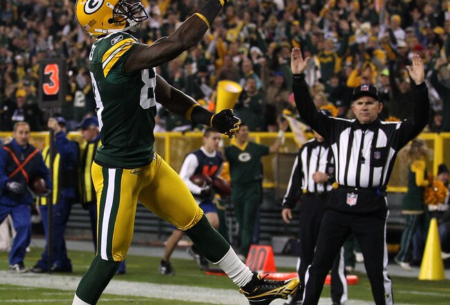 GREEN BAY, WI - NOVEMBER 07: James Jones #89 of the Green Bay Packers throws the ball into the air after scoring a touchdown against the Dallas Cowboys at Lambeau Field on November 7, 2010 in Green Bay, Wisconsin. (Photo by Jonathan Daniel/Getty Images)