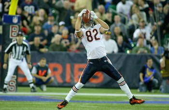 TORONTO, ON - NOVEMBER 07: Greg Olsen #82 of the Chicago Bears makes a catch to convert on third down against the Buffalo Bills  at Rogers Centre on November 7, 2010 in Toronto, Canada. Chicago won 22-19.  (Photo by Rick Stewart/Getty Images)