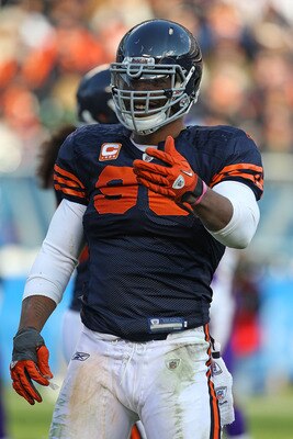 CHICAGO - NOVEMBER 14: Julius Peppers #90 of the Chicago Bears talks to a referee during a game against the Minnesota Vikings at Soldier Field on November 14, 2010 in Chicago, Illinois. The Bears defeated the Vikings 27-13. (Photo by Jonathan Daniel/Getty