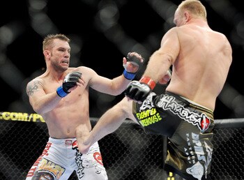 LAS VEGAS - NOVEMBER 21: Brian Foster (L) battles Brock Larson (R) during their Welterweight Fight at the UFC 106 at Mandalay Bay Events Center on November 21, 2009 in Las Vegas, Nevada. (Photo by Jon Kopaloff/Getty Images)