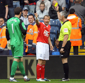 WEST BROMWICH, ENGLAND - SEPTEMBER 18:   Lee Bowyer of Birmingham is given a yellow card during the Barclays Premier League match between West Bromwich Albion and Birmingham City at The Hawthorns on September 18, 2010 in West Bromwich, England.  (Photo by
