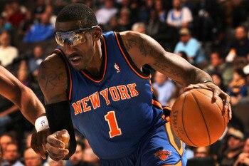 DENVER - NOVEMBER 16:  Amar'e Stoudemire #1 of the New York Knicks drive the ball against the Denver Nuggets at the Pepsi Center on November 16, 2010 in Denver, Colorado. The Nuggets defeated the Knicks 120-118. NOTE TO USER: User expressly acknowledges a