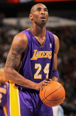 DENVER - NOVEMBER 11:  Kobe Bryant #24 of the Los Angeles Lakers takes a free throw against the Denver Nuggets at the Pepsi Center on November 11, 2010 in Denver, Colorado. The Nuggets defeated the Lakers 118-112.  NOTE TO USER: User expressly acknowledge