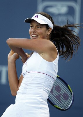 STANFORD, CA - JULY 29:  Ana Ivanovic of Serbia returns a shot to Marion Bartoli of France during Day 4 of the Bank of the West Classic at Stanford University on July 29, 2010 in Stanford, California.  (Photo by Ezra Shaw/Getty Images)