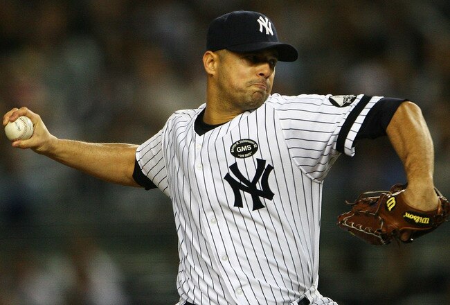 NEW YORK - SEPTEMBER 21:  Javier Vazquez #31 of the New York Yankees pitches against the Tampa Bay Rays on September 21, 2010 at Yankee Stadium in the Bronx borough of New York City. The Yankees defeated the Rays 8 -3.  (Photo by Andrew Burton/Getty Image
