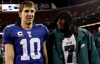 EAST RUTHERFORD, NJ - DECEMBER 13:  Eli Manning #10 of the New York Giants talks with Michael Vick #7 of the Philadelphia Eagles after their game at Giants Stadium on December 13, 2009 in East Rutherford, New Jersey.  (Photo by Nick Laham/Getty Images)
