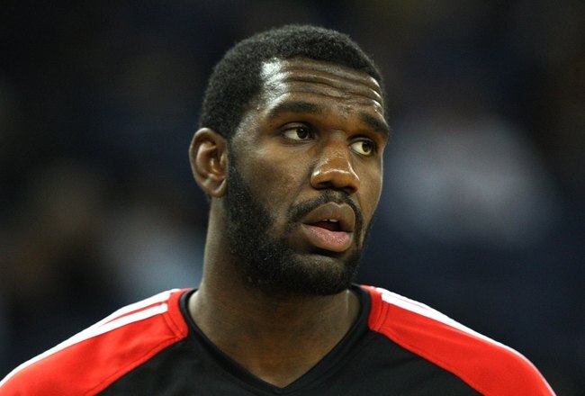 OAKLAND, CA - NOVEMBER 20:  Greg Oden #52 of the Portland Trail Blazers looks on against the Golden State Warriors during an NBA game at Oracle Arena on November 20, 2009 in Oakland, California.  (Photo by Jed Jacobsohn/Getty Images)