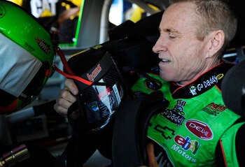 AVONDALE, AZ - NOVEMBER 13: Mark Martin sits aboard the #5 GoDaddy.com Chevrolet during practice for the NASCAR Sprint Cup Series Kobalt Tools 500 at Phoenix International Raceway on November 13, 2010 in Avondale, Arizona.  (Photo by Rusty Jarrett/Getty I