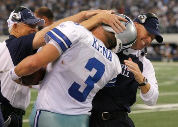 ARLINGTON, TX - NOVEMBER 21:  Head coach Jason Garrett (R) of the Dallas Cowboys celebrates with quarterback Jon Kitna #3 after scored against the Detroit Lions late in the fourth quarter at Cowboys Stadium on November 21, 2010 in Arlington, Texas.  The C