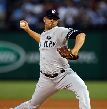 ARLINGTON, TX - SEPTEMBER 10:  Starting pitcher Javier Vasquez #31 of the New York Yankees pitches against the Texas Rangers on September 10, 2010 at Rangers Ballpark in Arlington, Texas.  (Photo by Tom Pennington/Getty Images)