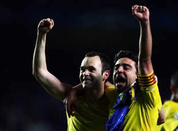 LONDON, ENGLAND - MAY 06:  (L-R)  Andres Iniesta and Xavi of Barcelona celebrate victory in the UEFA Champions League Semi Final match between Chelsea and Barcelona at Stamford Bridge on May 6, 2009 in London, England.  (Photo by Jamie McDonald/Getty Imag