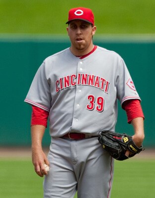 ST. LOUIS - MAY 2: Starting pitcher Aaron Harang #29 of the Cincinnati Reds reacts to giving up a home run against the St. Louis Cardinals at Busch Stadium on May 2, 2010 in St. Louis, Missouri. The Cardinals beat the Reds 6-0.  (Photo by Dilip Vishwanat/