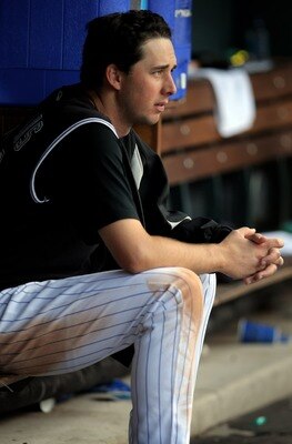 DENVER - MAY 24:  Starting pitcher Jeff Francis #26 of the Colorado Rockies as a seat in the dugout between innings as he collected the loss against the New York Mets at Coors Field on May 24, 2008 in Denver, Colorado. The Mets defeated the Rockies 9-2.