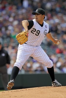 DENVER - APRIL 25:  Starting pitcher Jorge De La Rosa #29 of the Colorado Rockies delivers against the Florida Marlins at Coors Field on April 25, 2010 in Denver, Colorado. De La Rosa earned the win as the Rockies defeated the Marlins 8-4.  (Photo by Doug