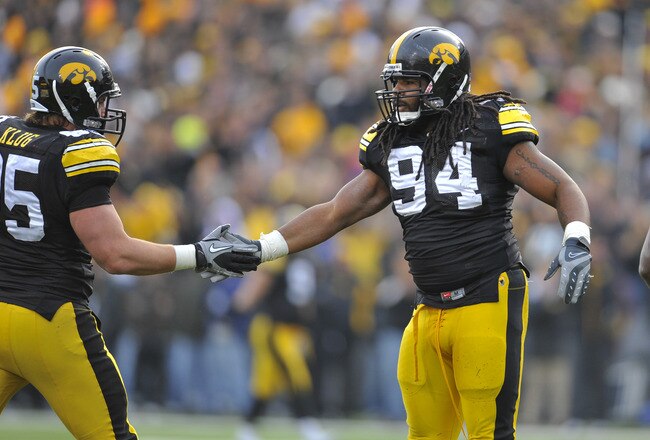IOWA CITY, IA - NOVEMBER 20:  Defensive linemen Adrian Clayborn #94 and Karly Klug #95 of the University of Iowa Hawkeyes celebrate a quarterback sack against the Ohio State Buckeyes during the first half of play at Kinnick Stadium on November 20, 2010 in
