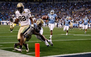 CHARLOTTE, NC - DECEMBER 26:  Jonathan Baldwin #82 of the Pittsburgh Panthers watches as teammate Dion Lewis #28 fumbles the ball at the goal line against the North Carolina Tar Heels during their game on December 26, 2009 in Charlotte, North Carolina.  (